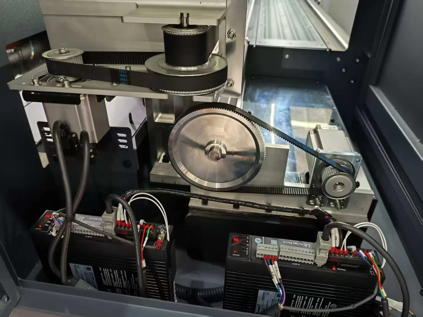 Close-up of the carriage drive and servo assembly